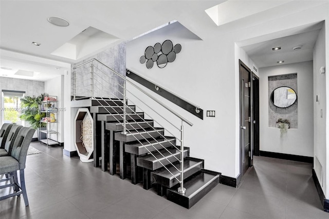 2612 Key Largo Ln, Fort Lauderdale, FL 33312 - staircase with baseboards and tile patterned floors