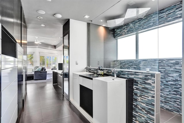 2612 Key Largo Ln, Fort Lauderdale, FL 33312 - kitchen with modern cabinets, ceiling fan, dark tile patterned flooring, white cabinetry, and recessed lighting