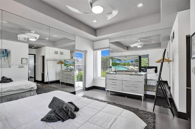 2612 Key Largo Ln, Fort Lauderdale, FL 33312 - bedroom featuring a tray ceiling, access to exterior, and recessed lighting