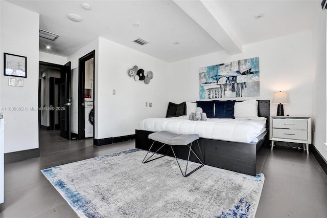 2612 Key Largo Ln, Fort Lauderdale, FL 33312 - bedroom with washer / clothes dryer and baseboards