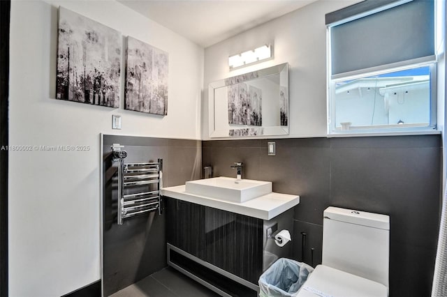 2612 Key Largo Ln, Fort Lauderdale, FL 33312 - bathroom featuring vanity, pet washing station, and a towel warming rack
