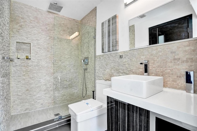 2612 Key Largo Ln, Fort Lauderdale, FL 33312 - full bathroom featuring a shower stall, vanity, tile walls, and decorative backsplash