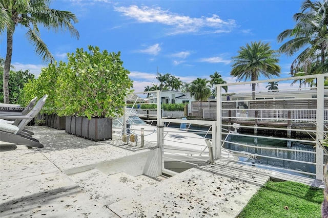 2612 Key Largo Ln, Fort Lauderdale, FL 33312 - dock area featuring a water view