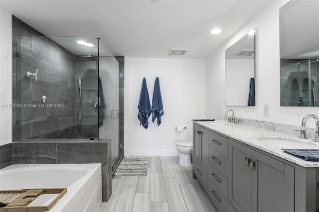 50 Biscayne Blvd Unit 3106, Miami, FL 33132 - full bathroom featuring double vanity, a stall shower, recessed lighting, a bath, and baseboards