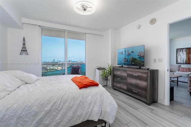 50 Biscayne Blvd Unit 3106, Miami, FL 33132 - bedroom with light wood finished floors and access to exterior