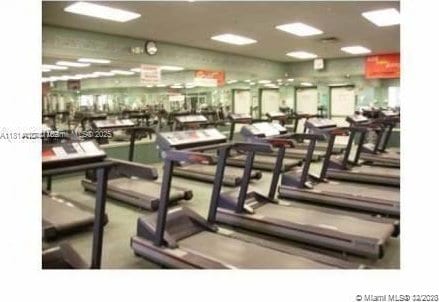 251 SW 132nd Way Unit 306H, Pembroke Pines, FL 33027 - community lobby with stairs, a high ceiling, and recessed lighting