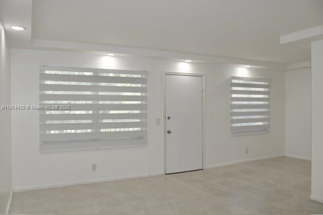 251 SW 132nd Way Unit 306H, Pembroke Pines, FL 33027 - unfurnished room with light tile patterned flooring