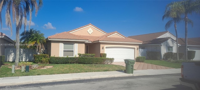 520 NW 166th Ave, Pembroke Pines, FL 33028 - mediterranean / spanish home featuring a tile roof, stucco siding, an attached garage, and decorative driveway