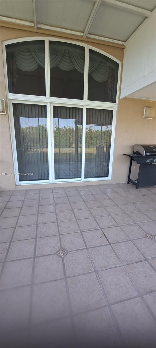 520 NW 166th Ave, Pembroke Pines, FL 33028 - view of patio / terrace