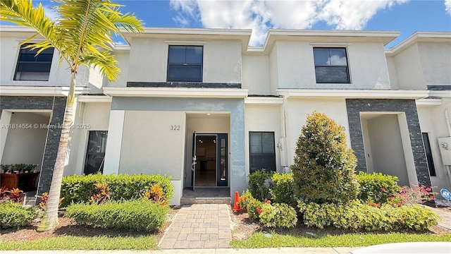 322 NE 1st Dr, Florida City, FL 33034 - townhome / multi-family property featuring stucco siding