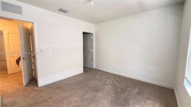 322 NE 1st Dr, Florida City, FL 33034 - unfurnished bedroom with carpet floors