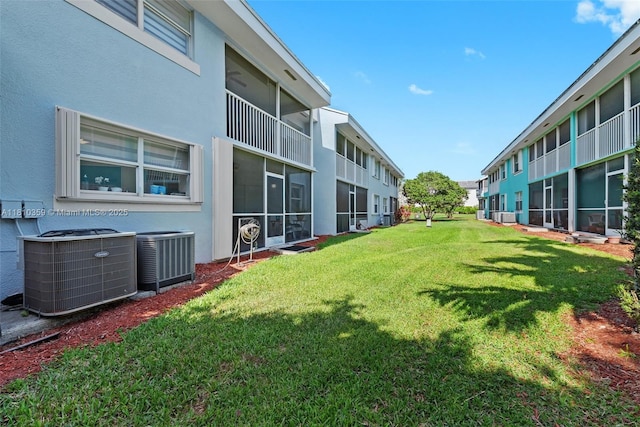 2649 SE 19th Ct Unit 106-D, Homestead, FL 33035 - view of green lawn with central air condition unit