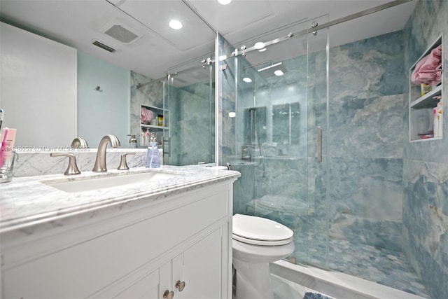 2649 SE 19th Ct Unit 106-D, Homestead, FL 33035 - bathroom with vanity, toilet, and a marble finish shower