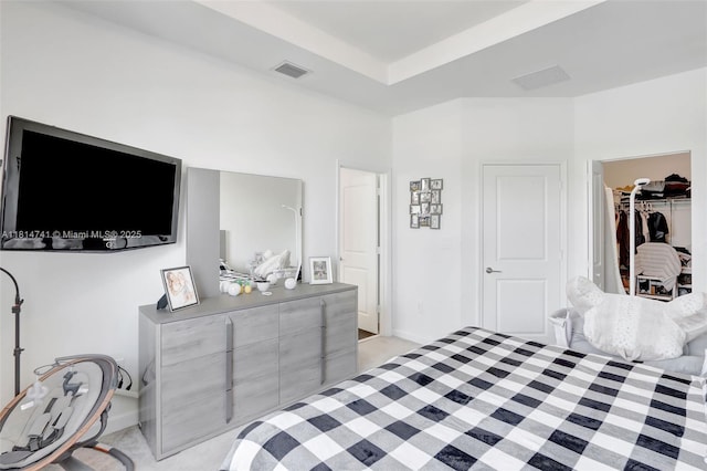 24686 SW 119th Pl, Homestead, FL 33032 - bedroom featuring light colored carpet and a walk in closet