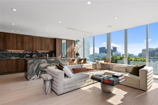 90 SW 3rd St Ph-14, Miami, FL 33130 - living area featuring a view of skyline and light wood-style flooring