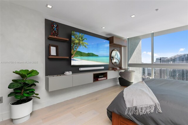 90 SW 3rd St Ph-14, Miami, FL 33130 - bedroom with light wood finished floors and floor to ceiling windows