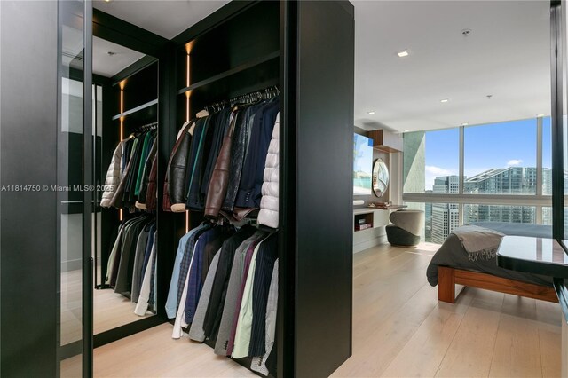 90 SW 3rd St Ph-14, Miami, FL 33130 - walk in closet featuring wood finished floors
