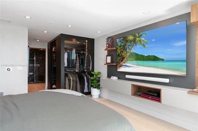 90 SW 3rd St Ph-14, Miami, FL 33130 - bedroom with wood finished floors, recessed lighting, and a closet