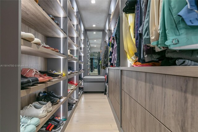 90 SW 3rd St Ph-14, Miami, FL 33130 - walk in closet featuring light wood-style flooring