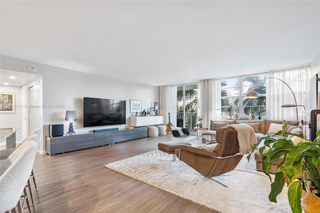 2150 Sans Souci Blvd Unit B311, North Miami, FL 33181 - living area featuring wood finished floors