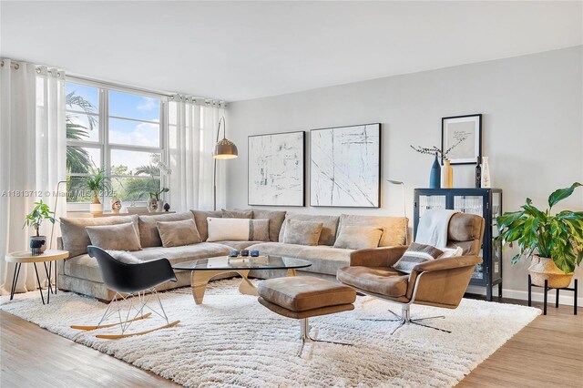 2150 Sans Souci Blvd Unit B311, North Miami, FL 33181 - living area with wood finished floors