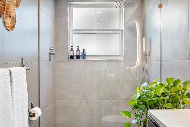 2150 Sans Souci Blvd Unit B311, North Miami, FL 33181 - full bathroom with a tile shower and vanity