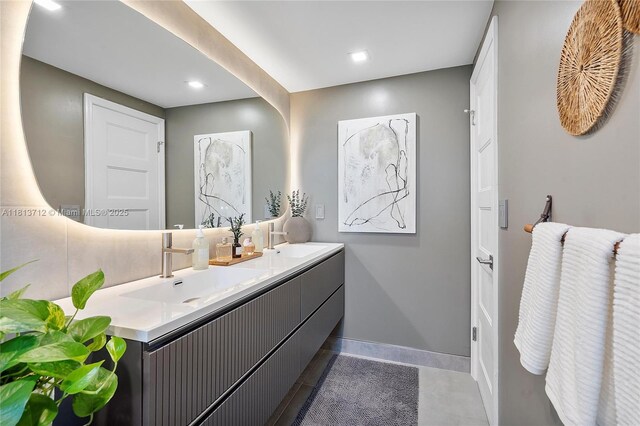 2150 Sans Souci Blvd Unit B311, North Miami, FL 33181 - full bathroom with double vanity, recessed lighting, tile patterned flooring, and baseboards