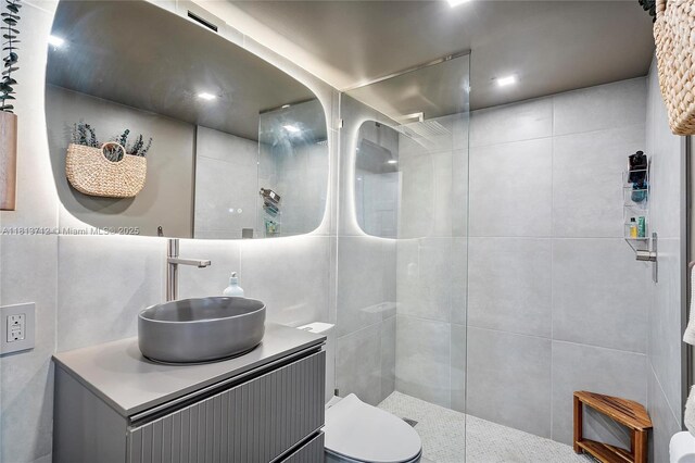 2150 Sans Souci Blvd Unit B311, North Miami, FL 33181 - bathroom with walk in shower, vanity, and toilet