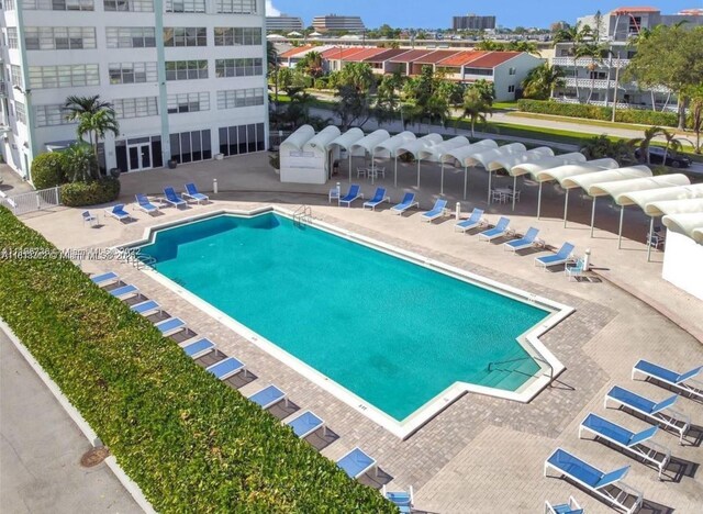 2150 Sans Souci Blvd Unit B311, North Miami, FL 33181 - community pool featuring a patio