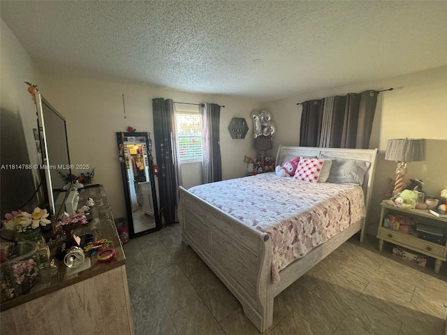 4706 25th Ave SW, Naples, FL 34116 - bedroom featuring a textured ceiling