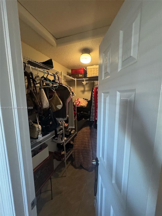 4706 25th Ave SW, Naples, FL 34116 - walk in closet with tile patterned floors
