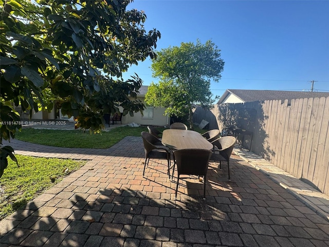 4706 25th Ave SW, Naples, FL 34116 - view of patio / terrace featuring outdoor dining area