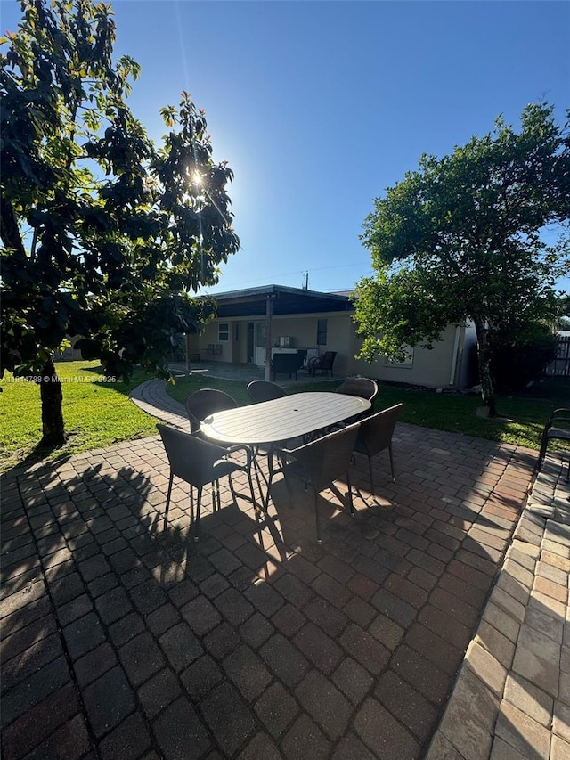 4706 25th Ave SW, Naples, FL 34116 - view of patio / terrace with outdoor dining area