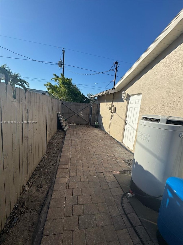 4706 25th Ave SW, Naples, FL 34116 - view of patio / terrace featuring a gate