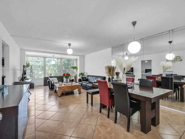 8401 Lagos De Campo Blvd Unit 210V, Tamarac, FL 33321 - dining space featuring light tile patterned floors