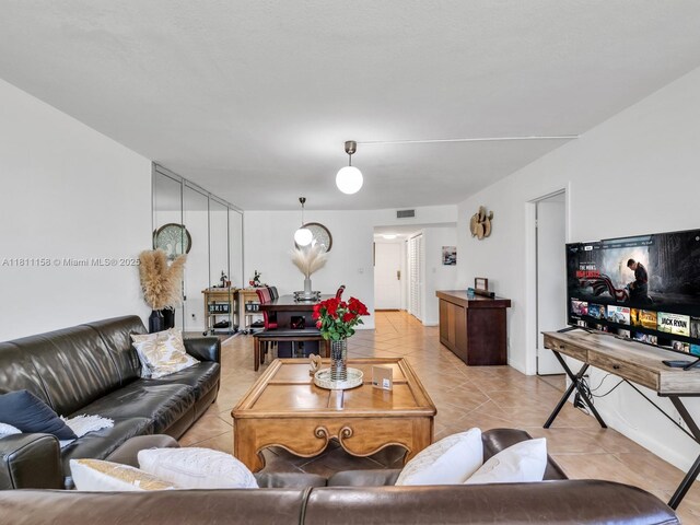 8401 Lagos De Campo Blvd Unit 210V, Tamarac, FL 33321 - living area with light tile patterned floors