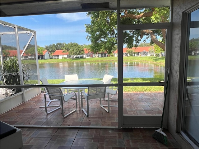 18428 Via Di Regina, Boca Raton, FL 33496 - sunroom featuring a water view