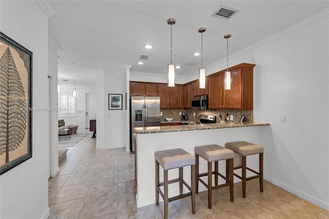 12441 Emerald Creek Mnr, Plantation, FL 33325 - kitchen featuring appliances with stainless steel finishes, stone counters, a peninsula, ornamental molding, and backsplash