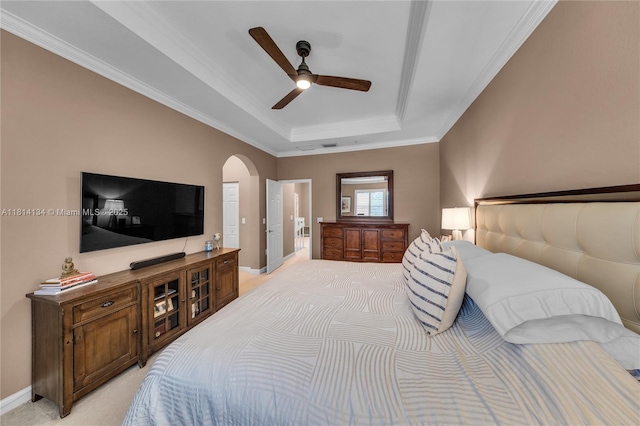 12441 Emerald Creek Mnr, Plantation, FL 33325 - bedroom featuring a tray ceiling, light carpet, arched walkways, baseboards, and ornamental molding