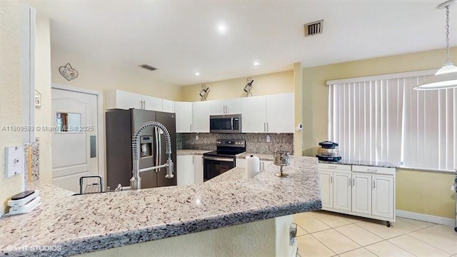 1102 SW 144th Ct, Miami, FL 33184 - kitchen featuring stainless steel microwave, electric range, fridge with ice dispenser, a peninsula, and recessed lighting