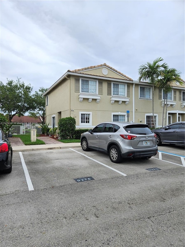 9279 Chambers St, Tamarac, FL 33321 - view of front of home with uncovered parking and stucco siding