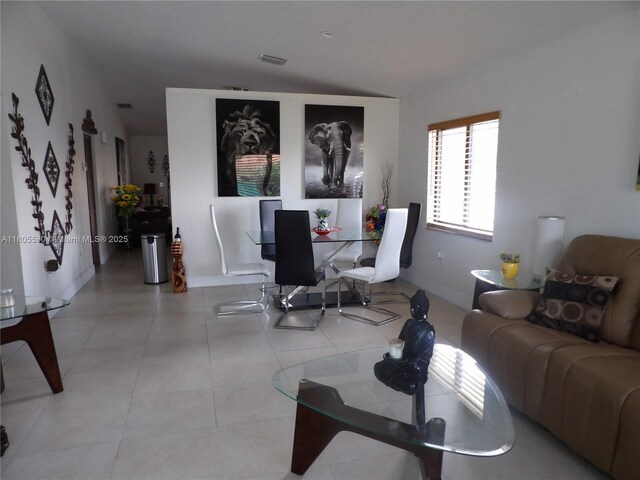 12210 SW 216th St, Miami, FL 33170 - living room with light tile patterned floors and baseboards