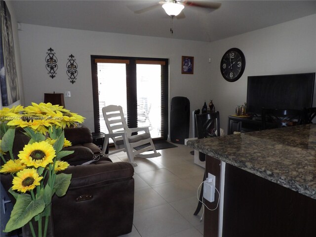 12210 SW 216th St, Miami, FL 33170 - living room with ceiling fan and light tile patterned floors
