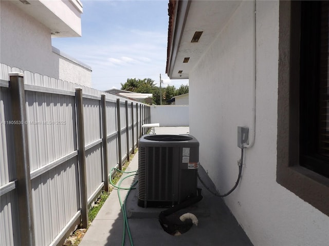 12210 SW 216th St, Miami, FL 33170 - view of patio / terrace featuring central AC