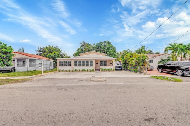 435 NW 44th Ave, Miami, FL 33126 - view of front of house featuring stucco siding
