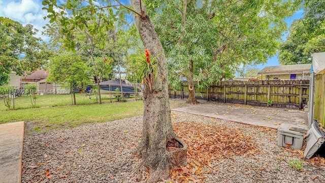 435 NW 44th Ave, Miami, FL 33126 - view of yard featuring a patio