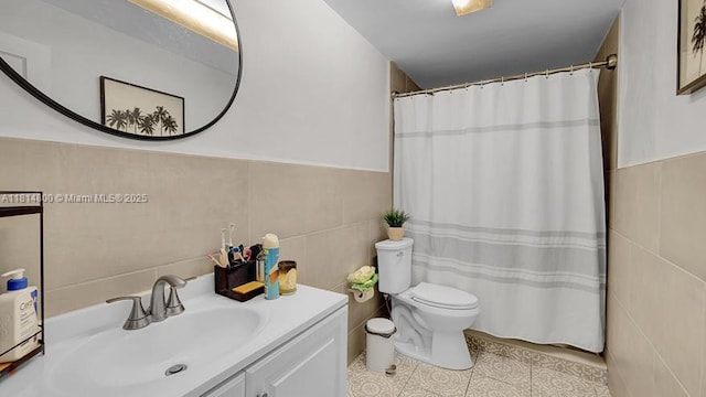 435 NW 44th Ave, Miami, FL 33126 - bathroom with tile walls, toilet, vanity, a shower with curtain, and tile patterned floors