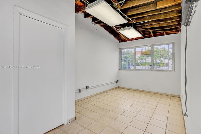 435 NW 44th Ave, Miami, FL 33126 - below grade area featuring light tile patterned floors