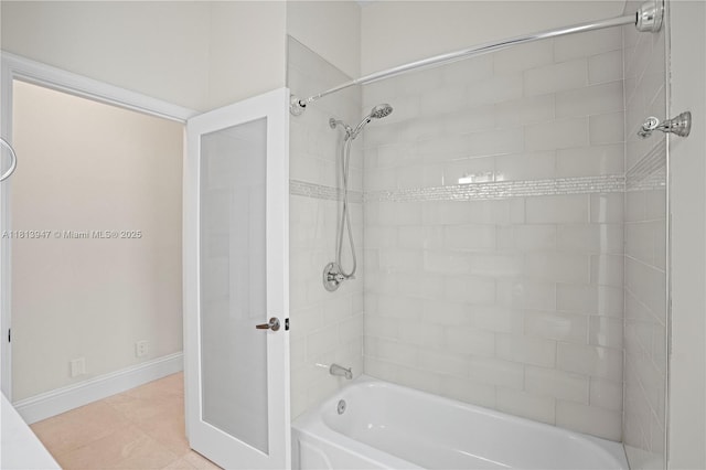 720 Cypress Pointe Dr W, Pembroke Pines, FL 33027 - bathroom featuring tile patterned flooring, baseboards, and bathing tub / shower combination