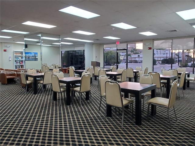 1865 S Ocean Dr Unit 10D, Hallandale Beach, FL 33009 - dining space with carpet flooring and a paneled ceiling